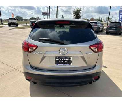 2013 Mazda CX-5 Touring is a Silver 2013 Mazda CX-5 Touring SUV in Brookshire TX