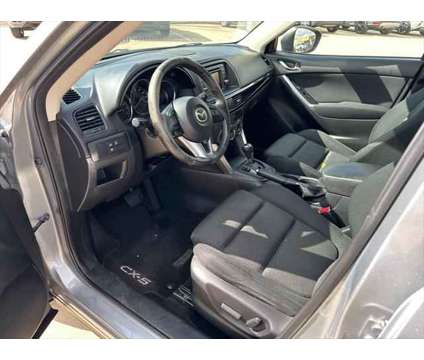 2013 Mazda CX-5 Touring is a Silver 2013 Mazda CX-5 Touring SUV in Brookshire TX