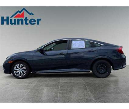 2020 Honda Civic LX Sedan is a Blue 2020 Honda Civic LX Sedan in Fletcher NC