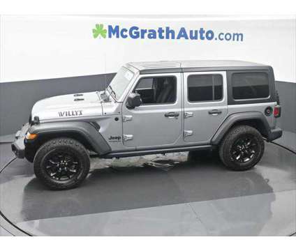 2021 Jeep Wrangler Unlimited Willys 4x4 is a Silver 2021 Jeep Wrangler Unlimited SUV in Dubuque IA