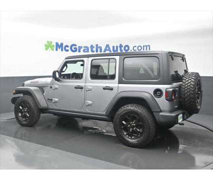 2021 Jeep Wrangler Unlimited Willys 4x4 is a Silver 2021 Jeep Wrangler Unlimited SUV in Dubuque IA