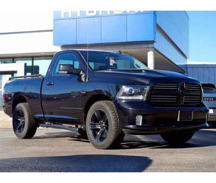 2016 Ram 1500 Sport is a Black 2016 RAM 1500 Model Sport Truck in Lawrence KS