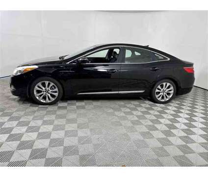 2013 Hyundai Azera Base is a Black 2013 Hyundai Azera Base Sedan in Pensacola FL