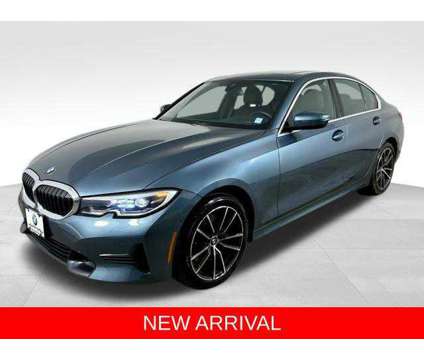 2021 BMW 3 Series xDrive is a Blue 2021 BMW 3-Series Sedan in Huntington Station NY