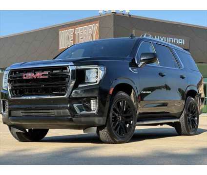 2021 GMC Yukon 2WD SLE is a Black 2021 GMC Yukon 1500 4dr SUV in Silsbee TX