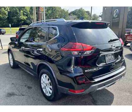 2019 Nissan Rogue SV is a Black 2019 Nissan Rogue SV Station Wagon in New Rochelle NY