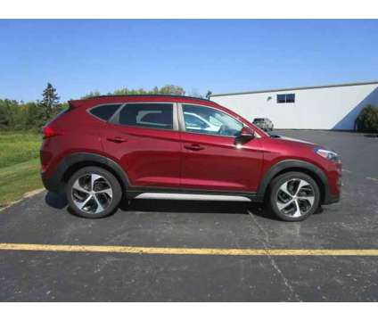 2018 Hyundai Tucson Value is a Red 2018 Hyundai Tucson Value SUV in Sault Sainte Marie MI