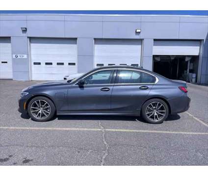 2021 BMW 3 Series 330e xDrive Sedan is a Grey 2021 BMW 3-Series Sedan in Freeport NY