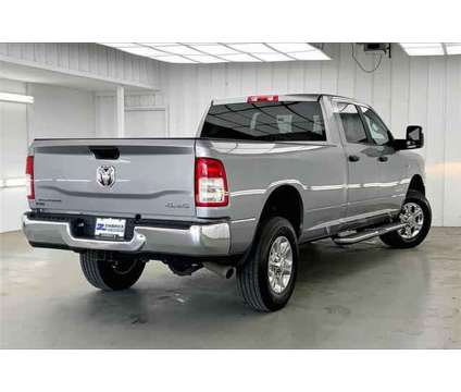 2023 Ram 2500 Big Horn Crew Cab 4x4 8 Box is a Silver 2023 RAM 2500 Model Big Horn Truck in Madison WI