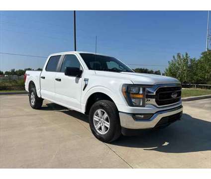 2023 Ford F-150 XLT is a White 2023 Ford F-150 XLT Truck in Brookshire TX