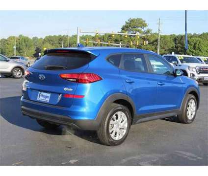 2020 Hyundai Tucson SE is a Blue 2020 Hyundai Tucson SE SUV in Goldsboro NC