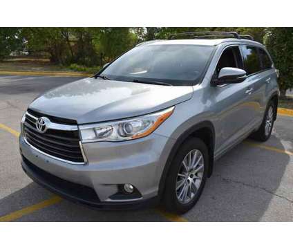 2015 Toyota Highlander XLE V6 is a Silver 2015 Toyota Highlander XLE SUV in Lawrence KS