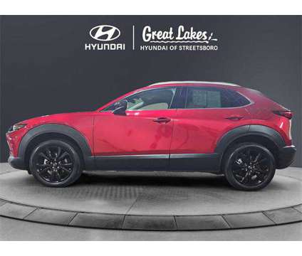 2023 Mazda CX-30 2.5 Turbo Premium is a Red 2023 Mazda CX-3 SUV in Streetsboro OH