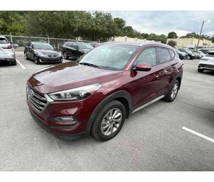 2017 Hyundai Tucson SE is a Red 2017 Hyundai Tucson SE SUV in Knoxville TN