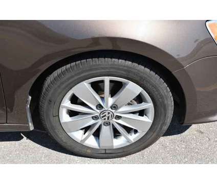 2015 Volkswagen Jetta 2.0L TDI SE is a Brown 2015 Volkswagen Jetta 2.5 Trim Sedan in Lawrence KS