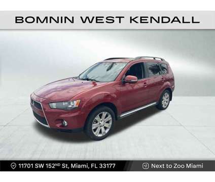 2010 Mitsubishi Outlander SE is a Red 2010 Mitsubishi Outlander SE SUV in Miami FL