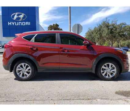 2019 Hyundai Tucson Value is a Red 2019 Hyundai Tucson Value SUV in Deland FL