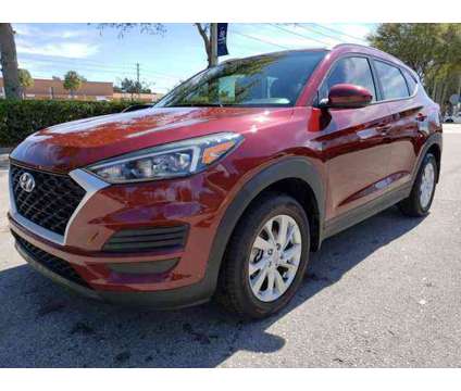 2019 Hyundai Tucson Value is a Red 2019 Hyundai Tucson Value SUV in Deland FL