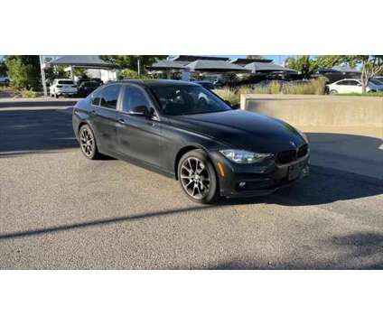 2017 BMW 3 Series xDrive is a Black 2017 BMW 3-Series Sedan in Loveland CO