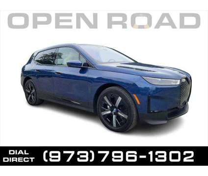 2024 BMW iX xDrive50 is a Blue 2024 BMW 325 Model iX SUV in Morristown NJ