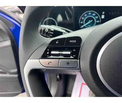 2024 Hyundai Elantra Hybrid Blue is a Blue 2024 Hyundai Elantra Hybrid in Fletcher NC