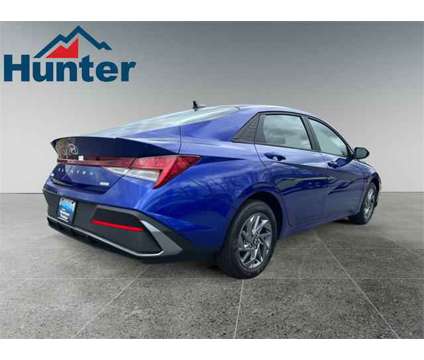 2024 Hyundai Elantra Hybrid Blue is a Blue 2024 Hyundai Elantra Hybrid in Fletcher NC