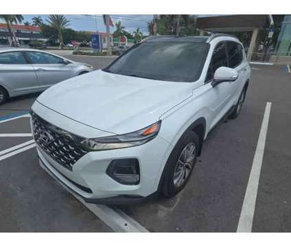 2020 Hyundai Santa Fe Limited 2.4 is a White 2020 Hyundai Santa Fe Limited SUV in Deerfield Beach FL