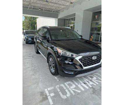 2019 Hyundai Tucson SEL is a Black 2019 Hyundai Tucson SUV in Deland FL