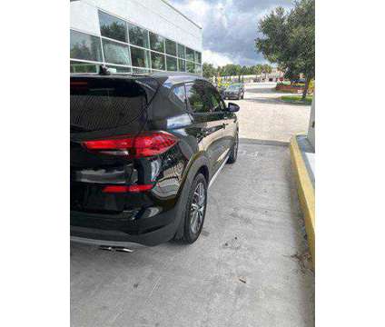 2019 Hyundai Tucson SEL is a Black 2019 Hyundai Tucson SUV in Deland FL