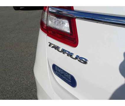 2018 Ford Taurus Limited is a Silver, White 2018 Ford Taurus Limited Sedan in Fall River MA