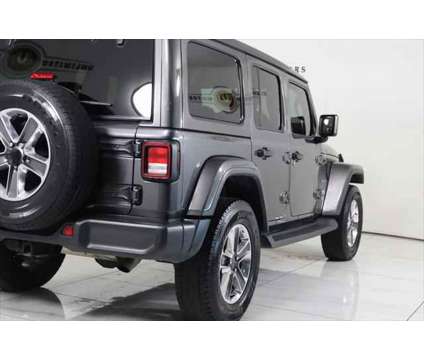 2022 Jeep Wrangler Unlimited Unlimited Sahara is a Grey 2022 Jeep Wrangler Unlimited SUV in Westfield IN