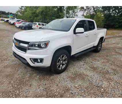 2016 Chevrolet Colorado 4WD Z71 is a White 2016 Chevrolet Colorado Truck in Howell MI