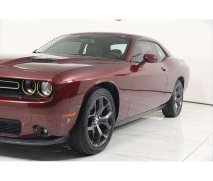 2018 Dodge Challenger SXT is a Red 2018 Dodge Challenger SXT Coupe in Westfield IN