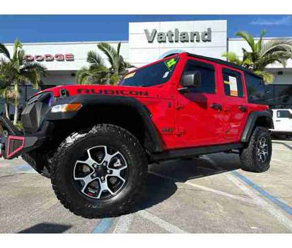 2022 Jeep Wrangler Unlimited Rubicon is a Red 2022 Jeep Wrangler Unlimited SUV in Vero Beach FL