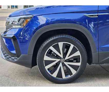 2024 Volkswagen Taos SE is a Blue 2024 SUV in Austin TX