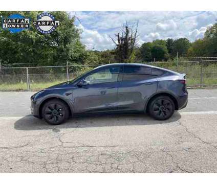 2024 Tesla Model Y Long Range is a Blue 2024 Station Wagon in Madison NC