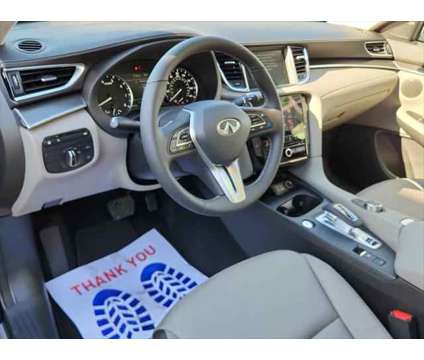 2024 Infiniti QX50 LUXE AWD is a Blue 2024 Infiniti QX50 Luxe Station Wagon in Newark DE