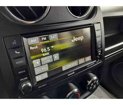 2017 Jeep Patriot High Altitude is a White 2017 Jeep Patriot High Altitude Car for Sale in Triadelphia WV