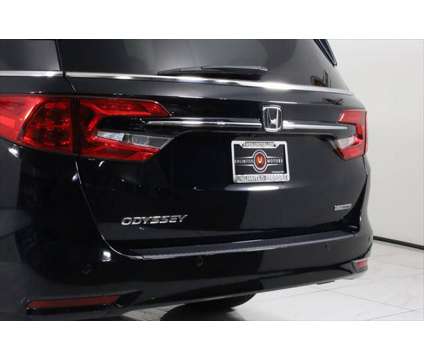 2022 Honda Odyssey Touring is a Black 2022 Honda Odyssey Touring Car for Sale in Westfield IN