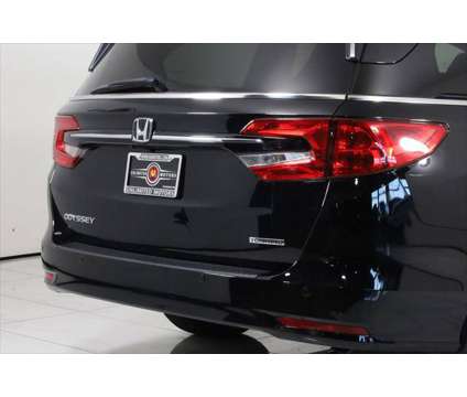 2022 Honda Odyssey Touring is a Black 2022 Honda Odyssey Touring Car for Sale in Westfield IN