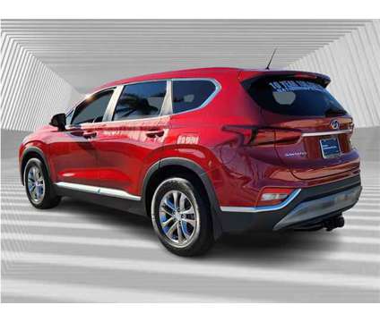 2020 Hyundai Santa Fe SE is a Red 2020 Hyundai Santa Fe SE SUV in Fort Lauderdale FL