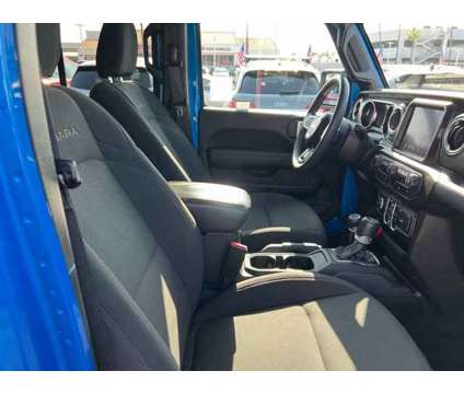 2023 Jeep Wrangler Sahara is a Blue 2023 Jeep Wrangler Sahara SUV in Tustin CA