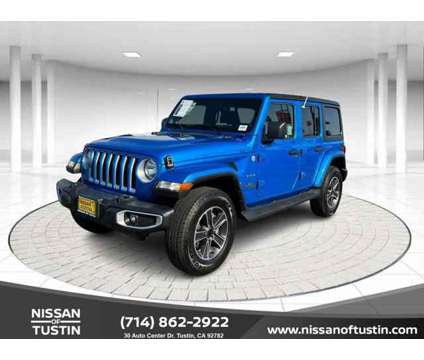 2023 Jeep Wrangler Sahara is a Blue 2023 Jeep Wrangler Sahara SUV in Tustin CA