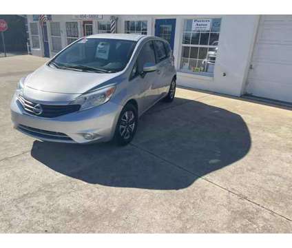 2015 Nissan Versa for sale is a Silver 2015 Nissan Versa 1.6 Trim Hatchback in Summerfield FL