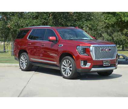 2021 GMC Yukon 4WD Denali is a Red 2021 GMC Yukon 4WD SUV in Houston TX