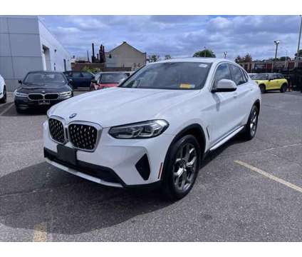 2022 BMW X4 xDrive30i is a White 2022 BMW X4 xDrive30i SUV in Freeport NY