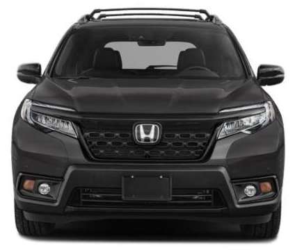 2021 Honda Passport AWD Elite is a Silver, White 2021 Honda Passport SUV in Lawrence KS