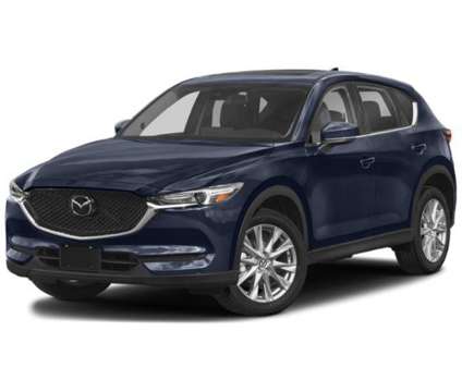 2021 Mazda CX-5 Grand Touring is a Blue 2021 Mazda CX-5 Grand Touring SUV in Lawrence KS