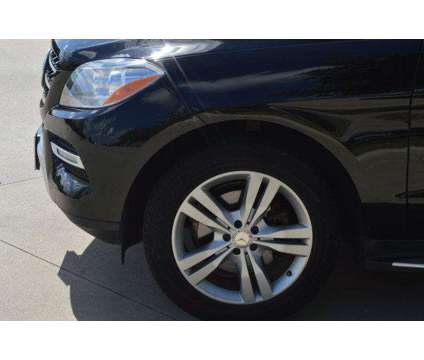 2013 Mercedes-Benz M-Class 4MATIC is a Black 2013 Mercedes-Benz M Class SUV in Houston TX