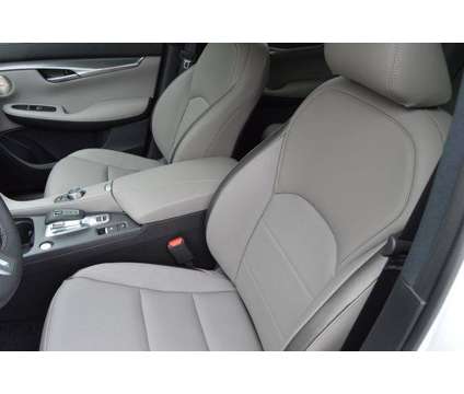 2024 Infiniti QX50 LUXE is a White 2024 Infiniti QX50 Luxe Station Wagon in Houston TX